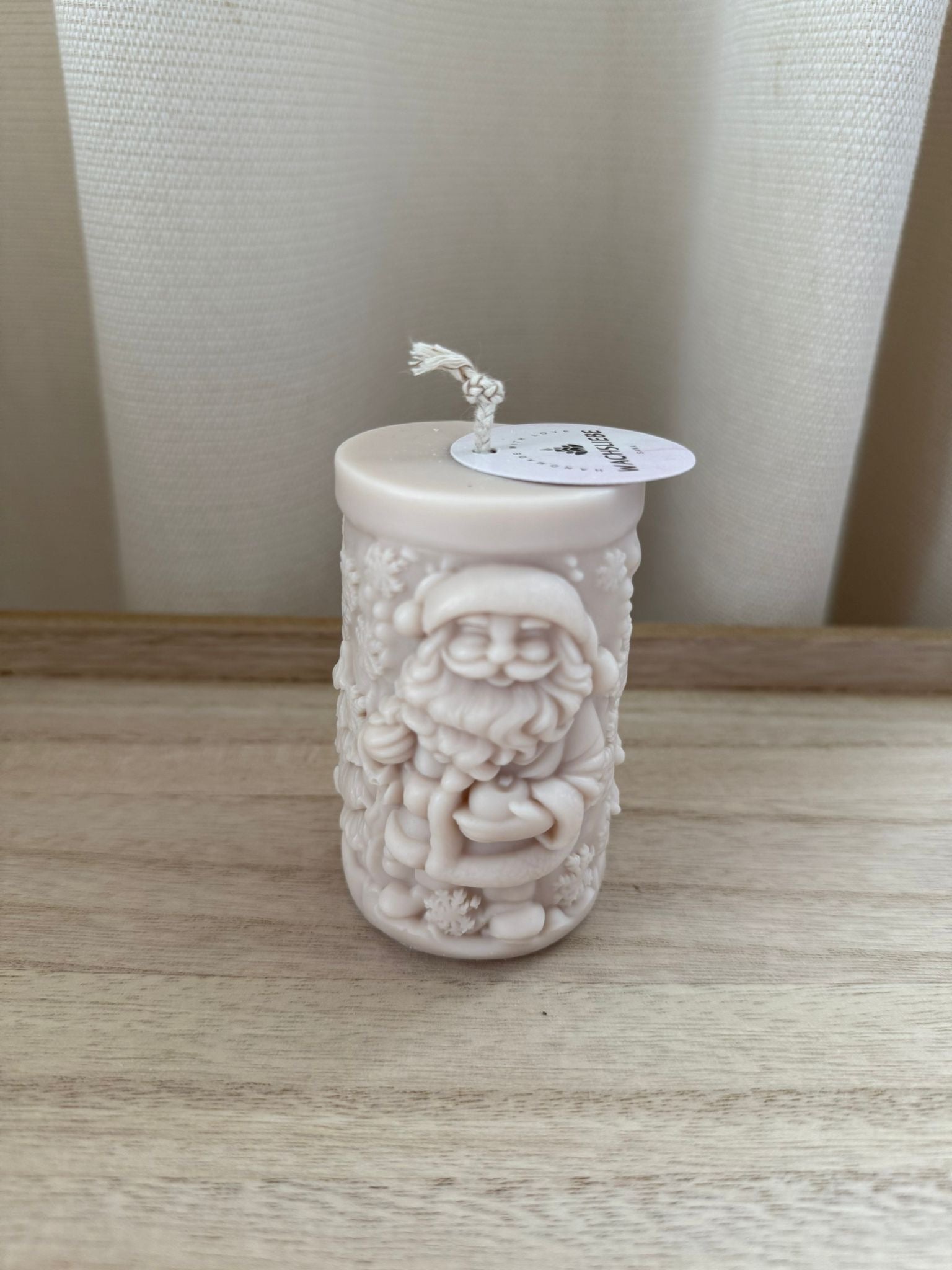 Kerze mit Weihnachtsmann Muster